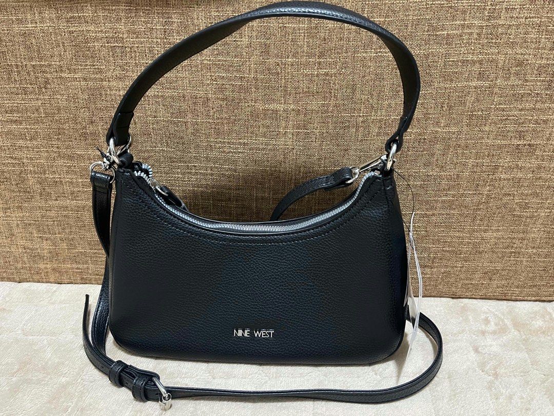 Nine West Sling bag (Category: Shoulder Bags) located in Quezon City. Submitted by mackoyusgoods (Listing ID 1469136501, Image 2). Description: .
