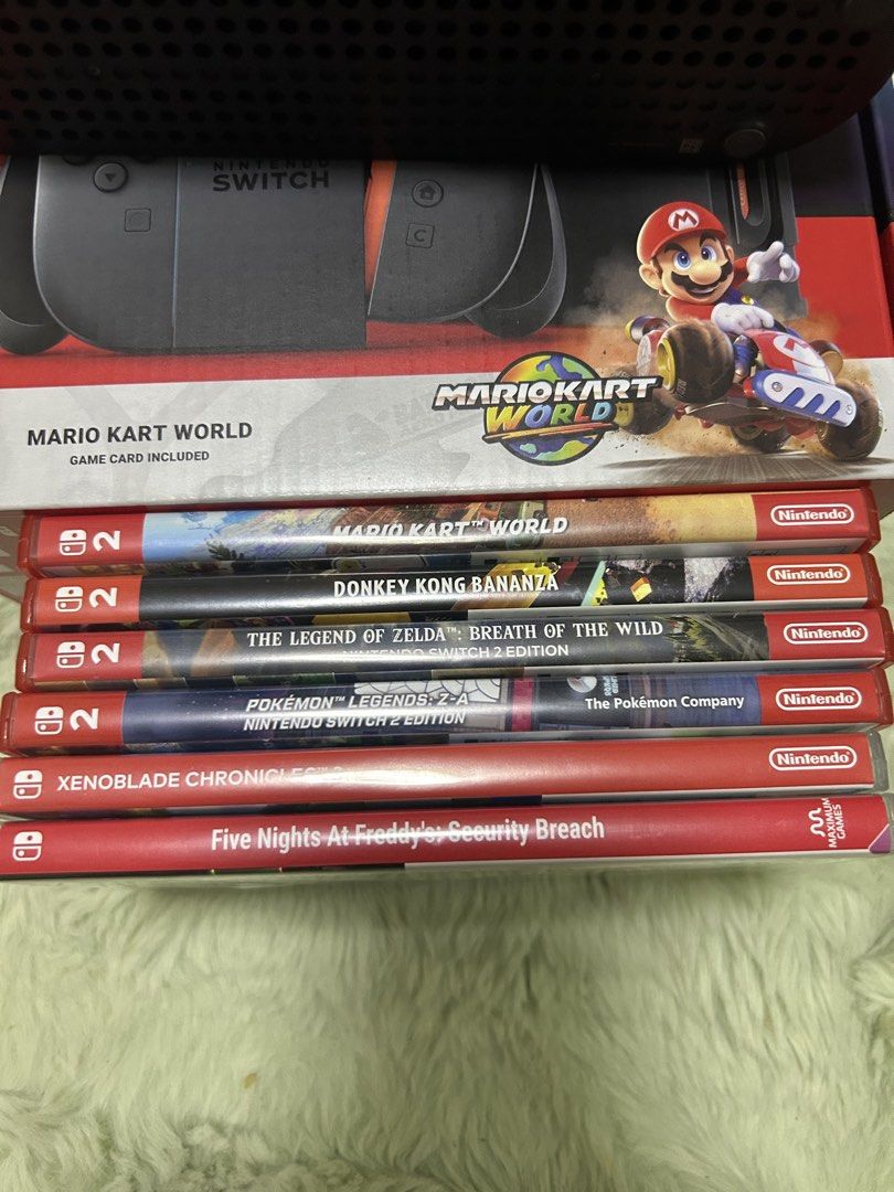 Nintendo switch 2 with games in Davao PH (Category: Nintendo) located in Manila. Submitted by jamesjr_363 (Listing ID 1469104096, Image 2). Description: Included is a Nintendo switch 2 with extended 256mb memory and 6 games. Games included are: Mario kart word Donkey Kong bananza The legend of Zelda breath of the wild Nintendo switch 2 edition Pokemon legends z-a Xenoblade chronicles 3 Five nights at Freddy’s: security breach. Price is firm and p
