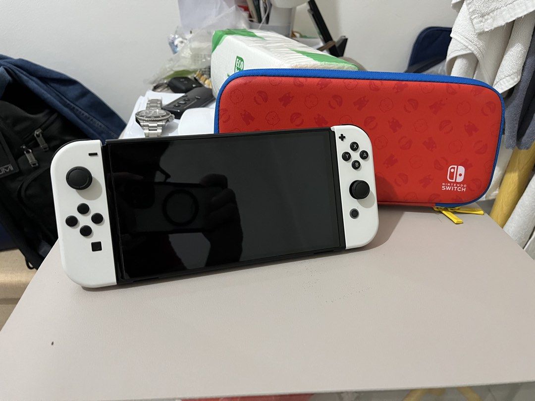 Nintendo Switch Oled (Category: Nintendo) located in Taguig. Submitted by cellp3 (Listing ID 1469155411, Image 1). Description: White Nintendo Switch OLED WITH FREEBIES - 2 Games Included Like new condition and no issues w/ receipt from datablitz 13,499 php 📍Manila Doctors Hospital (weekdays) 📍EGI Taft Towers (weekends) Inclusions: ✅White Nintendo Switch ✅ Original Box ✅ Charger ✅ Joy-Con (L&R) ✅ Joy-Con Straps ✅ Joy-Con Grip ✅ HDMI Cable ✅ Doc