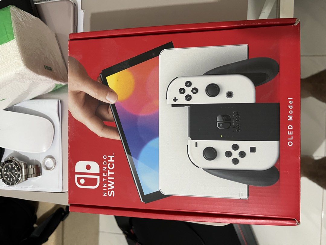 Nintendo Switch Oled (Category: Nintendo) located in Taguig. Submitted by cellp3 (Listing ID 1469155411, Image 2). Description: White Nintendo Switch OLED WITH FREEBIES - 2 Games Included Like new condition and no issues w/ receipt from datablitz 13,499 php 📍Manila Doctors Hospital (weekdays) 📍EGI Taft Towers (weekends) Inclusions: ✅White Nintendo Switch ✅ Original Box ✅ Charger ✅ Joy-Con (L&R) ✅ Joy-Con Straps ✅ Joy-Con Grip ✅ HDMI Cable ✅ Doc