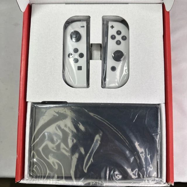 Nintendo Switch OLED Model White Joy-Con (Category: Nintendo) located in Valenzuela. Submitted by keenmoon_83da25 (Listing ID 1469077322, Image 3). Description: Got the Nintendo Switch OLED model in white. Box opened just to check contents. Console, Joy-Cons, dock, cables, and power supply all included inside. Everything packed securely in original packaging. Great setup for handheld or TV gaming. Ready to play right out of the box..