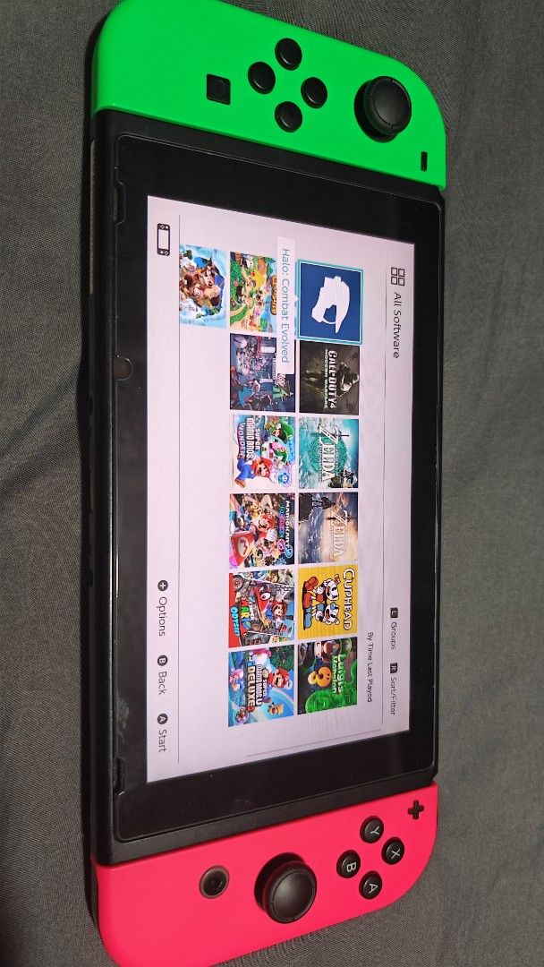 Nintendo Switch V1 Jailbreak (Category: Nintendo) located in Makati City. Submitted by dewthemove07154 (Listing ID 1468957396, Image 2). Description: nintendo Switch V1 jailbreak 128gb sd card dualboot with screen protector no box and hdmi meet up location makati/taguig.