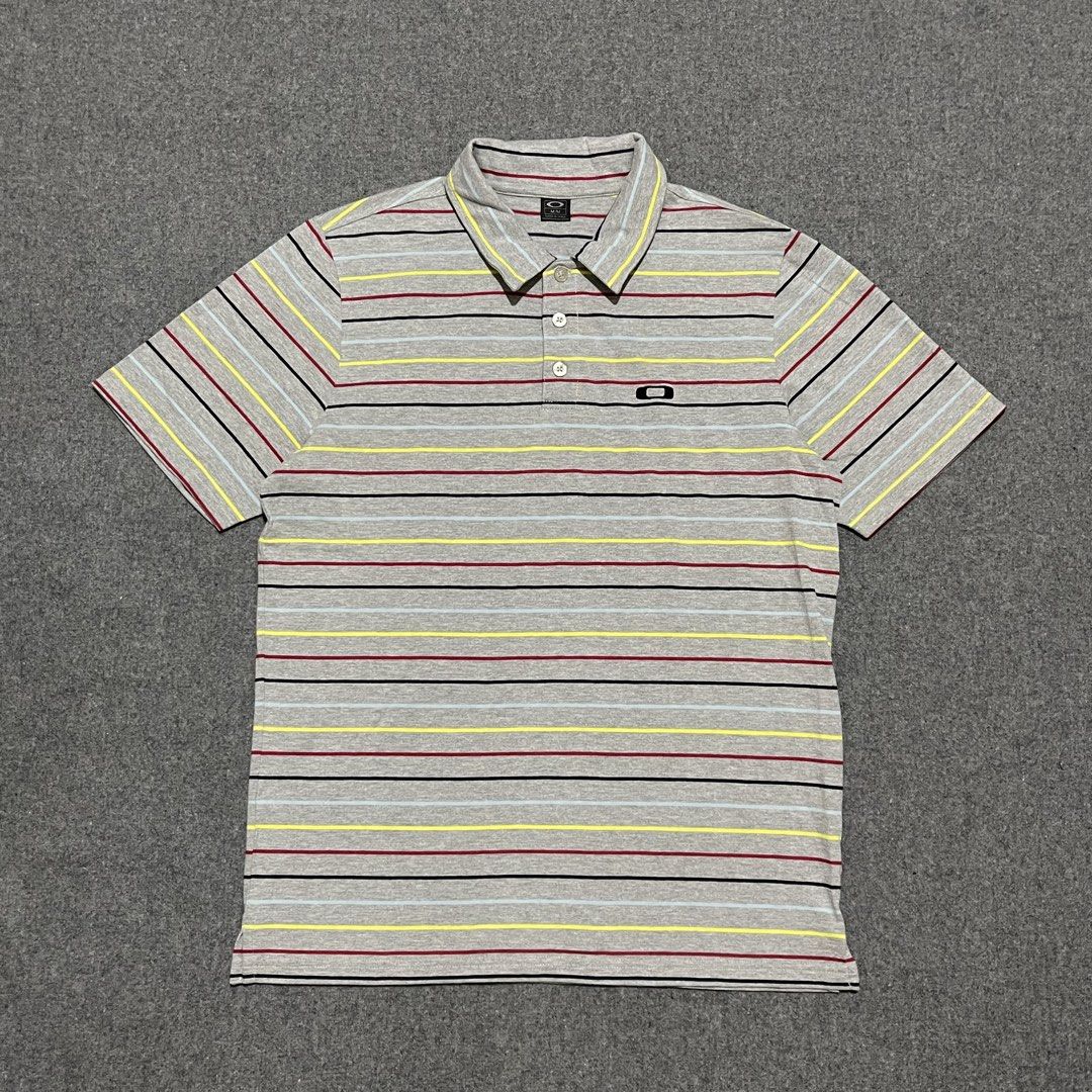 Oakley - Striped Polo Shirt (Medium) (Category: Tshirts & Polo Shirts ) located in Pasig City. Submitted by _rosasass_ (Listing ID 1469106791, Image 1). Description: Authntic Good as new Size medium Width 21 Length 27.