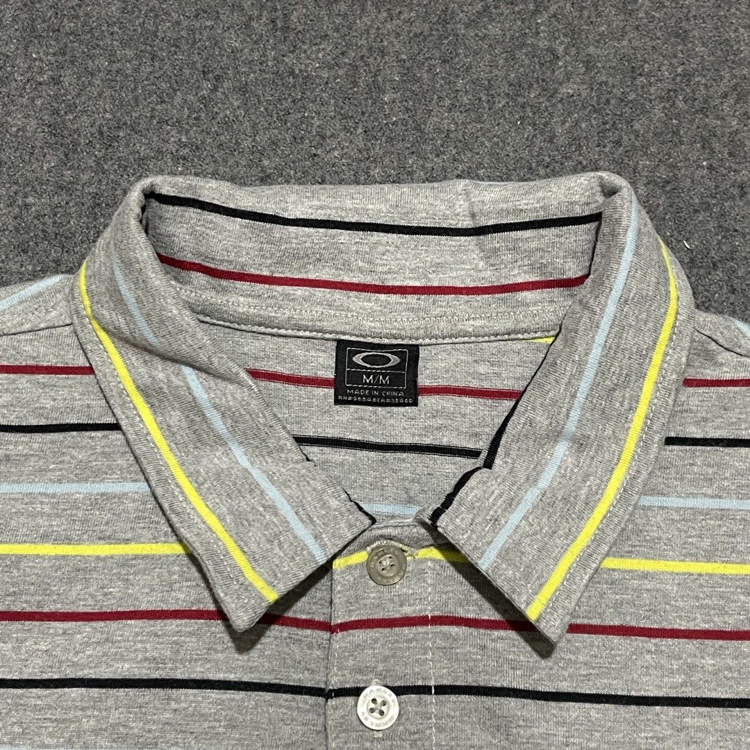 Oakley - Striped Polo Shirt (Medium) (Category: Tshirts & Polo Shirts ) located in Pasig City. Submitted by _rosasass_ (Listing ID 1469106791, Image 3). Description: Authntic Good as new Size medium Width 21 Length 27.