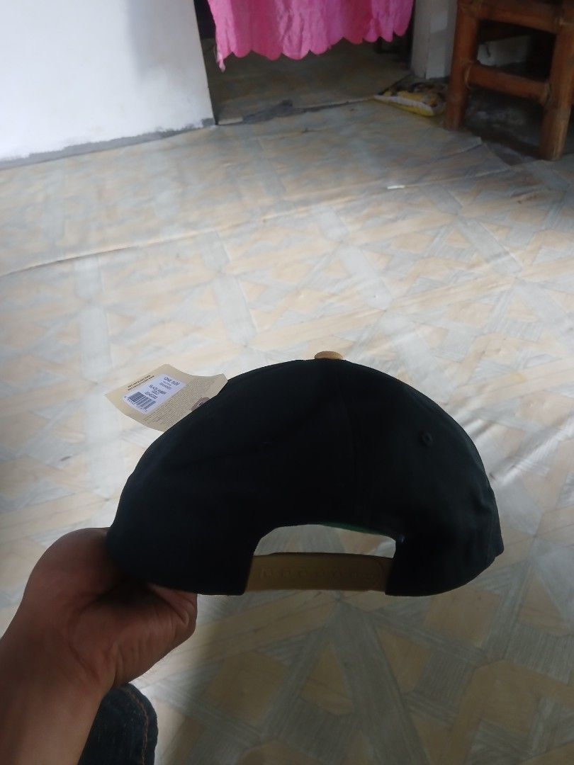 Obey Black Amber Gold Snapback Hat (Category: Caps & Hats) located in San Jose. Submitted by garments17 (Listing ID 1468961411, Image 2). Description: - Brand: Obey - Color: Black and Amber Gold - Condition: Brand new with original tags attached - Material: 100% cotton (Made in Bangladesh) - Size: One size fits all with adjustable snap closure - Details: Classic green under brim and round embroidered patch logo on the front crown.