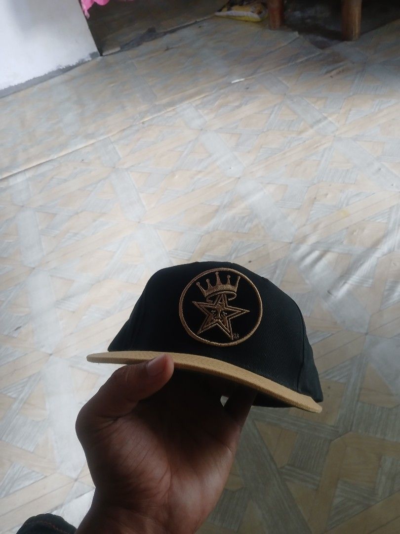 Obey Black Amber Gold Snapback Hat (Category: Caps & Hats) located in San Jose. Submitted by garments17 (Listing ID 1468961411, Image 1). Description: - Brand: Obey - Color: Black and Amber Gold - Condition: Brand new with original tags attached - Material: 100% cotton (Made in Bangladesh) - Size: One size fits all with adjustable snap closure - Details: Classic green under brim and round embroidered patch logo on the front crown.