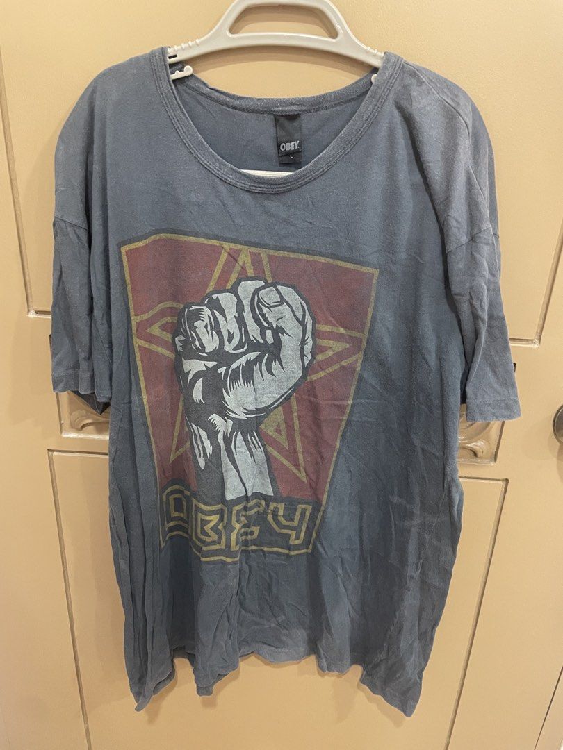 OBEY GRAPHIC SHIRT (Category: Tshirts & Polo Shirts ) located in Manila. Submitted by bedlambuzz (Listing ID 1469033620, Image 1). Description: Stain in the back but not noticeable .