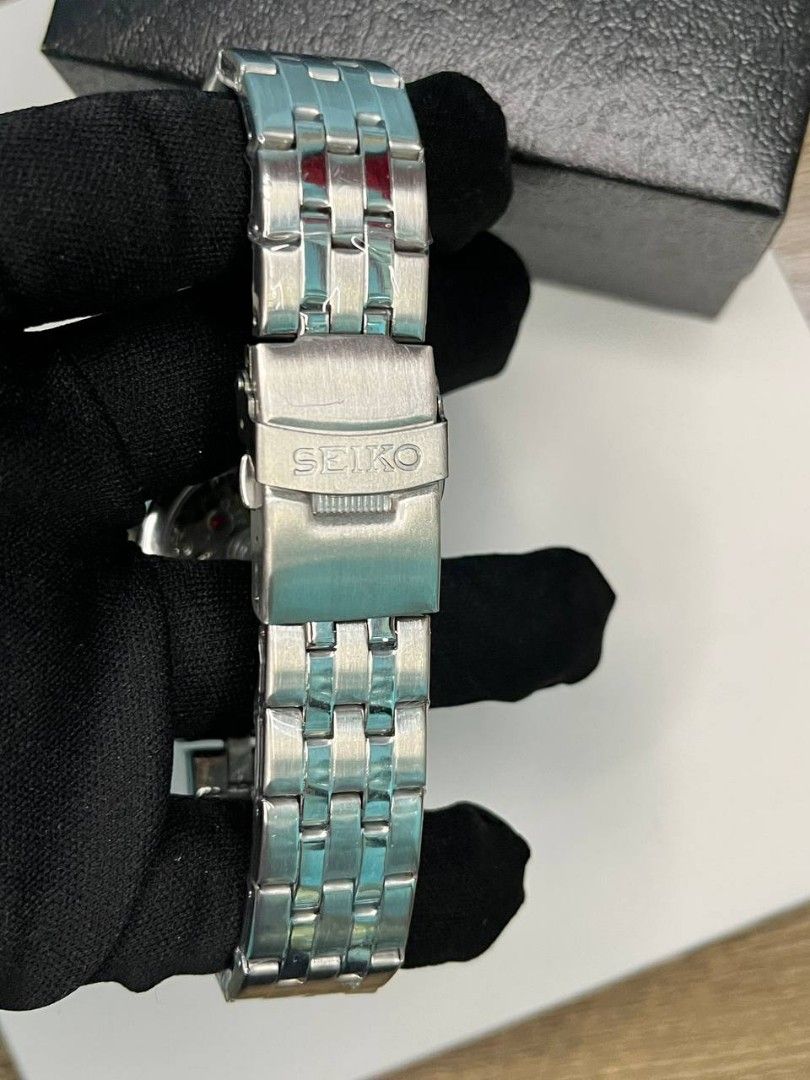 OEM WATCH ONLY‼️ (Category: Men's Watches) located in Manila. Submitted by seannathan46011 (Listing ID 1469069962, Image 2). Description: Authentic Seiko 5 Sports GMT automatic watch with a striking black dial, Pepsi bezel, and steel bracelet. Comes complete with the original box, outer bag, and exhibition case back. PM for details!.