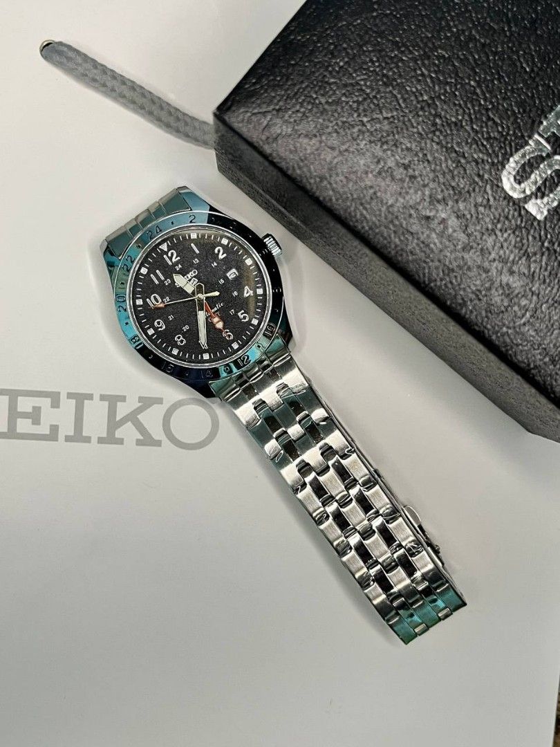 OEM WATCH ONLY‼️ (Category: Men's Watches) located in Manila. Submitted by seannathan46011 (Listing ID 1469069962, Image 3). Description: Authentic Seiko 5 Sports GMT automatic watch with a striking black dial, Pepsi bezel, and steel bracelet. Comes complete with the original box, outer bag, and exhibition case back. PM for details!.