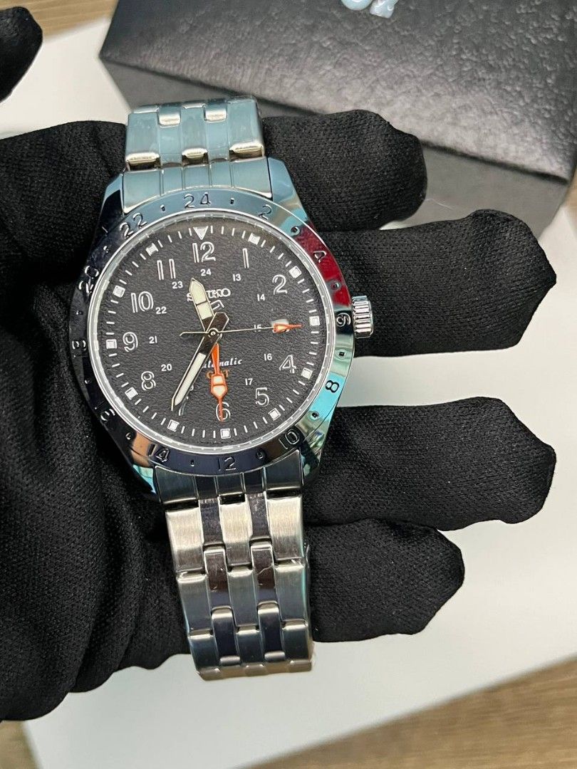 OEM WATCH ONLY‼️ (Category: Men's Watches) located in Manila. Submitted by seannathan46011 (Listing ID 1469069962, Image 1). Description: Authentic Seiko 5 Sports GMT automatic watch with a striking black dial, Pepsi bezel, and steel bracelet. Comes complete with the original box, outer bag, and exhibition case back. PM for details!.