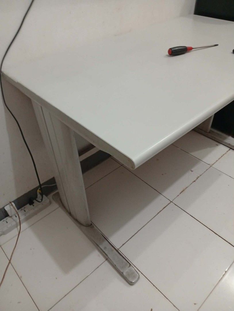 OFFICE STAFF TABLE (Category: Office Furniture & Fixtures) located in Manila. Submitted by allenmaca23282 (Listing ID 1468945444, Image 2). Description: OFFICE STAFF TABLE W x H x L - 120*70*70 cm Sign of usage in the legs, but the table itself is makinis pa. Naka dismantle na para di mahirap ibyahe Good for WFH/ PC set up Selling for 1500 Location: South Caloocan For pick up or lalamove.