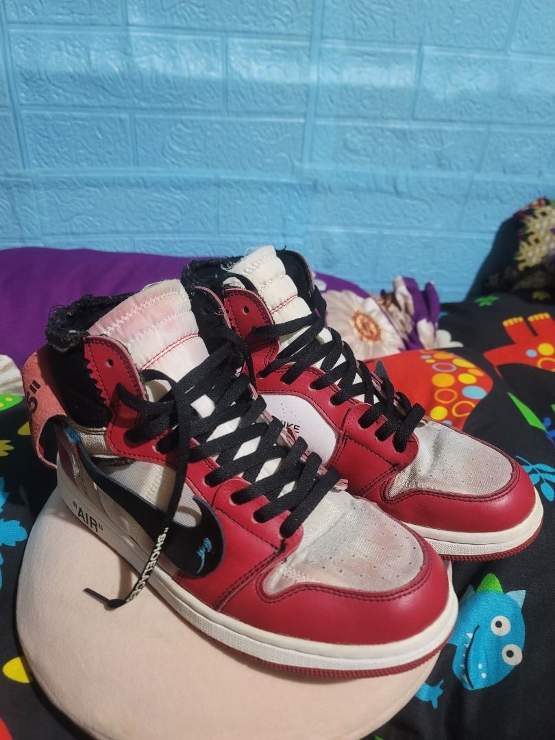 Off-White x Nike Air Jordan 1 Chicago (Category: Sneakers) located in Caloocan City. Submitted by remwil18 (Listing ID 1468933257, Image 1). Description: - Model: Off-White x Nike Air Jordan 1 Chicago - Size: US 8.5 / UK 7.5 / EUR 42 / CM 26.5 - Features: Classic deconstructed design, exposed foam collar, and signature Helvetica text - Perfect holy grail or collector's piece for serious sneakerheads.