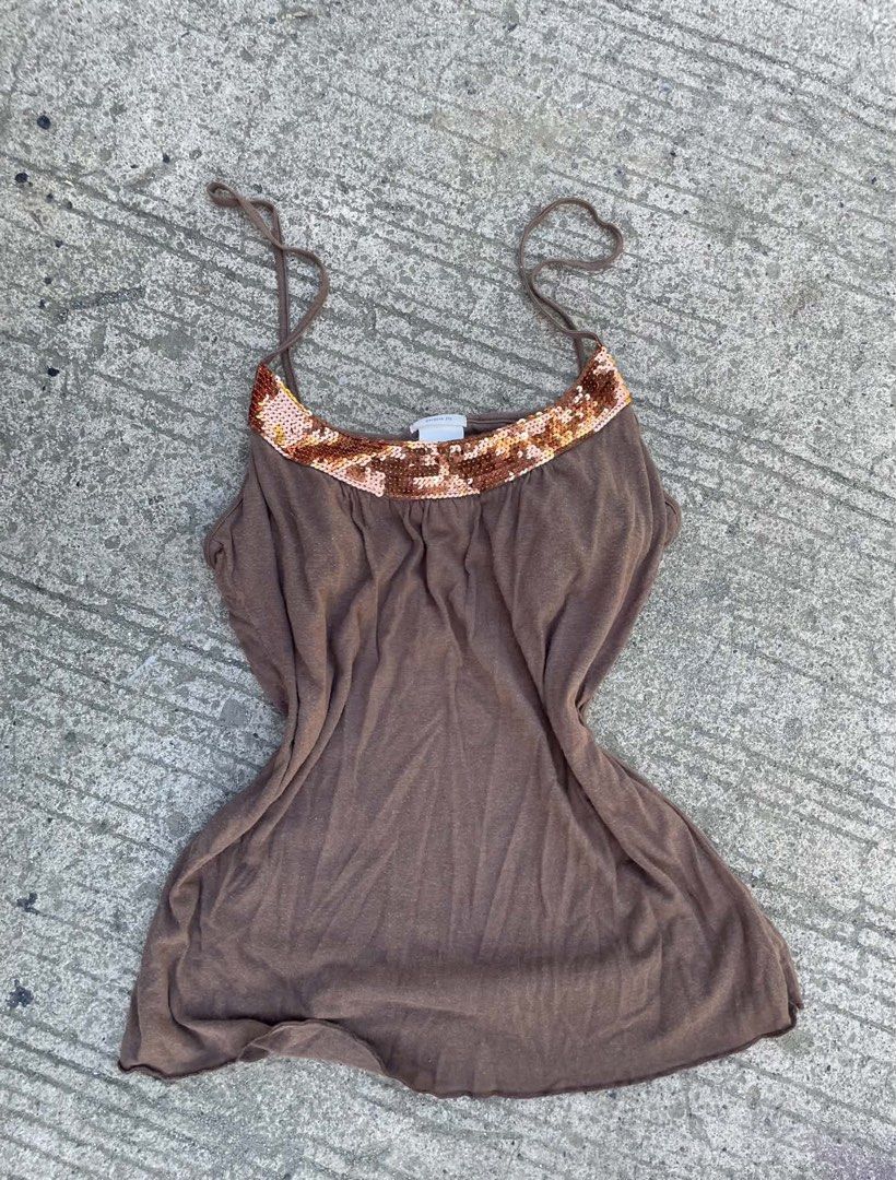 Old Navy Brown Tank Top with Sequins Medium (Category: Sleeveless) located in Manila. Submitted by declutterwithme07 (Listing ID 1469032014, Image 1). Description: - Brand: Old Navy - Color: Brown with shimmering copper sequin trim - Size: Medium - Straps: Thin spaghetti straps - Fit: Soft, relaxed, and flowy - Origin: Made in Russia - Condition: Excellent.
