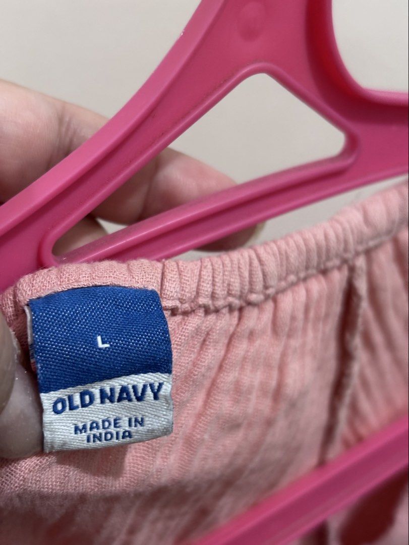 Old Navy Pink Long Sleeve Button Blouse Size L (Category: Longsleeves) located in Caloocan City. Submitted by stuff_shop (Listing ID 1469090553, Image 2). Description: Old Navy gauze blouse in dusty pink. Size L tag attached. Long sleeves with ruffled cuffs, button-up neckline placket. Crinkled cotton texture throughout, relaxed fit. Easy casual wear. Fits up to XL.