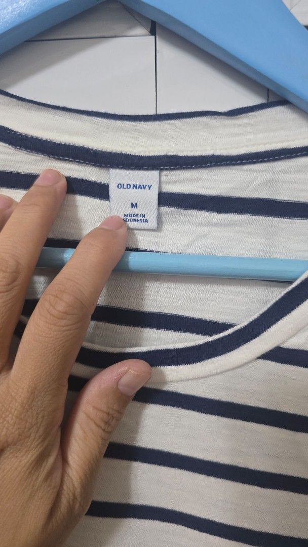Old Navy Striped Jumpsuit Size M (Category: Jumpsuits) located in Cabanatuan. Submitted by belle_1013 (Listing ID 1469070577, Image 3). Description: - Brand: Old Navy - Color: Navy and white stripes - Size: Medium - Material: Soft knit - Features: Short sleeves, round neckline, and elasticated waist - Style: Easy pull-on, perfect for casual days out - Origin: Made in Indonesia.