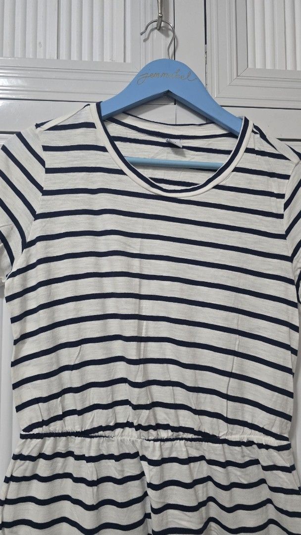 Old Navy Striped Jumpsuit Size M (Category: Jumpsuits) located in Cabanatuan. Submitted by belle_1013 (Listing ID 1469070577, Image 2). Description: - Brand: Old Navy - Color: Navy and white stripes - Size: Medium - Material: Soft knit - Features: Short sleeves, round neckline, and elasticated waist - Style: Easy pull-on, perfect for casual days out - Origin: Made in Indonesia.