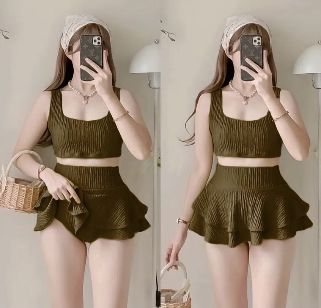olive green 2 piece swimsuit (Category: Bikinis & Swimsuits) located in Manila. Submitted by anastacia___b (Listing ID 1469012404, Image 1). Description: never used kasi malaki sa upper part ng body ko :) bought from tiktok fits 30-33 wl :).