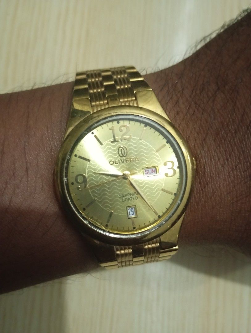 Olivera (Category: Men's Watches) located in Las Pinas. Submitted by quick_deals_great_finds2 (Listing ID 1469070620, Image 3). Description: Original good working condition Quartz with battery 38mm medium unisex.