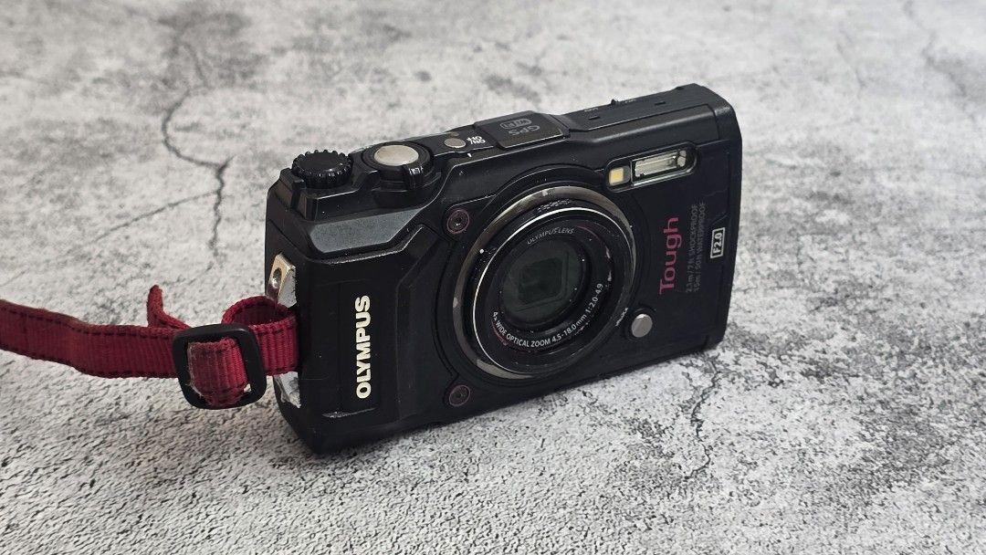 Olympus Tough TG-5 Waterproof Digital Camera (Category: Cameras) located in Manila. Submitted by cocoyboy (Listing ID 1469031410, Image 1). Description: - Olympus Tough TG-5 compact digital camera in black - Shoots stunning 4K video with built-in GPS and Wi-Fi - Fast F2.0 lens for great low-light performance - Rugged, waterproof, and shockproof design built for the outdoors - Includes a stylish red hand strap attached to the side lug - Shows norm