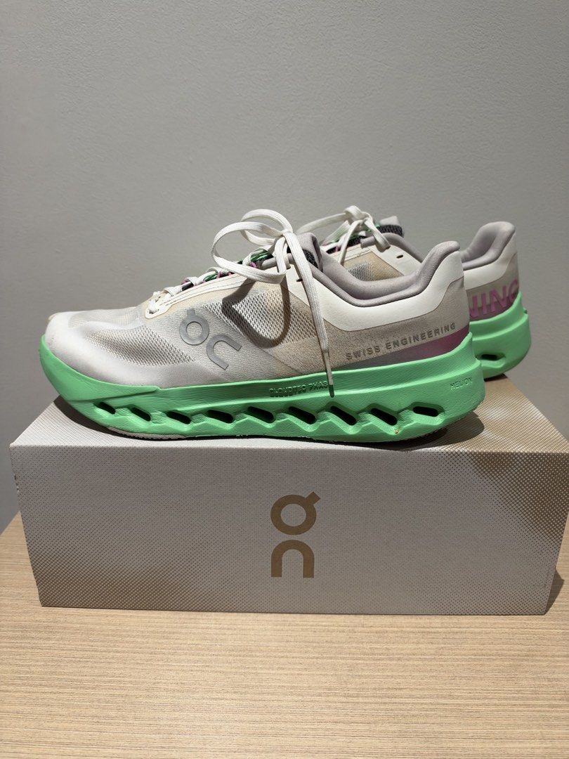 On Cloudsurfer Next (Category: Sneakers) located in Manila. Submitted by eldridge_ng (Listing ID 1468999419, Image 1). Description: - Brand: On - Model: Cloudsurfer Next - Colorway: wolf / Honeydew Green - Size: Men's US 10 / EU 44 / UK 9.5 - Cushioning: Swiss-engineered CloudTec Phase with Helion superfoam - Condition: lightly used - Inclusions: Original box included RFS: extra shoes may cloudtilt na ako Price : 4,800 (negotiable).