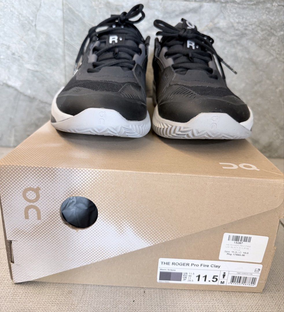 On The Roger Pro Fire Clay Black Eclipse US 11.5 (Category: Sneakers) located in Cainta. Submitted by r.acal (Listing ID 1469025959, Image 2). Description: - Brand: On (The Roger Pro) - Color: Black Eclipse - Size: US 11.5 / EU 46 / UK 11 - Condition: Brand new, never worn, with original tags and box - Performance: Engineered for clay court play with superior grip and stability.
