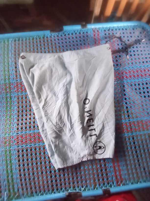 O'Neill Light Blue Board Shorts Size 40 (Category: Swim Trunks & Board Shorts) located in Manila. Submitted by boot_tdm (Listing ID 1468707102, Image 3). Description: - Brand: O'Neill - Color: Light Blue - Size: 40 - Waist: Drawstring closure for an adjustable fit - Pockets: Convenient side cargo pocket with flap closure - Details: Large O'Neill text branding printed on the leg - Ideal for: Beach trips, pool days, and casual swimwear - Origin: Ma
