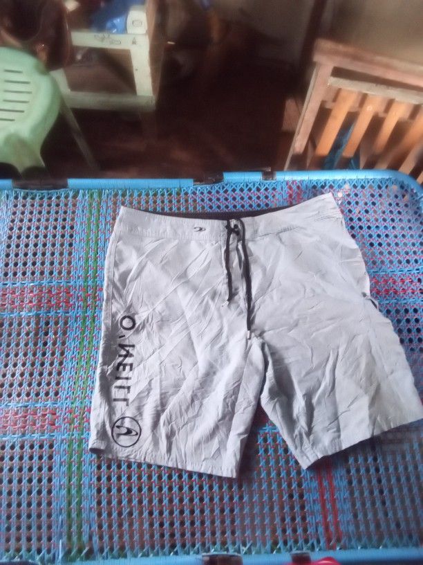 O'Neill Light Blue Board Shorts Size 40 (Category: Swim Trunks & Board Shorts) located in Manila. Submitted by boot_tdm (Listing ID 1468707102, Image 2). Description: - Brand: O'Neill - Color: Light Blue - Size: 40 - Waist: Drawstring closure for an adjustable fit - Pockets: Convenient side cargo pocket with flap closure - Details: Large O'Neill text branding printed on the leg - Ideal for: Beach trips, pool days, and casual swimwear - Origin: Ma