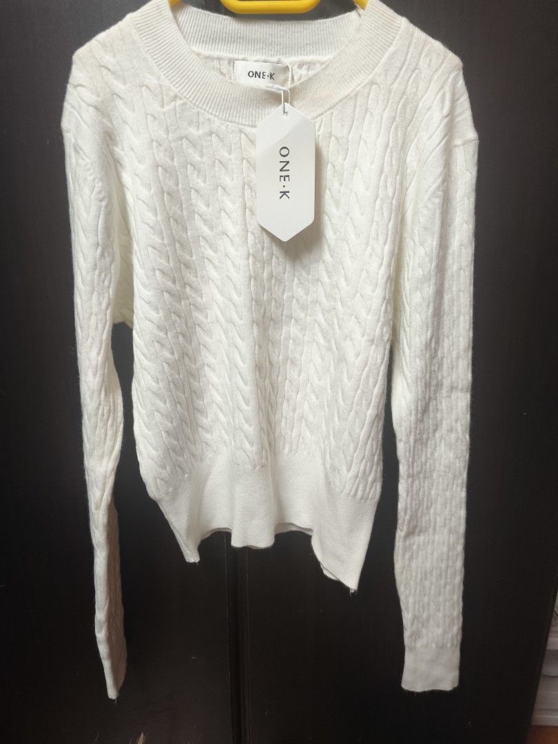 ONE-K White Cable Knit Sweater (Category: Coats, Jackets and Outerwear) located in Quezon City. Submitted by ng.stephanielauren (Listing ID 1469108938, Image 1). Description: - Brand: ONE-K - Color: White - Style: Cable knit sweater with classic crew neckline - Details: Long sleeves with ribbed cuffs and hem - Condition: Brand new with tags still attached.