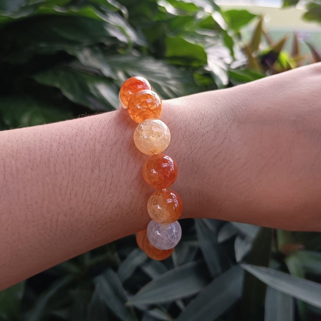 Orange Crackle Agate (Category: Bracelets) located in Manila. Submitted by enchantra_gems (Listing ID 1469044232, Image 2). Description: 🧡 ORANGE CRACKLE AGATE BRACELET Bold Orange • Statement Style • Enchantra Gemstones Make a statement with the vibrant beauty of Orange Crackle Agate. ✨ Featuring bold 14mm orange beads with distinctive crackle-like patterns, this bracelet brings a warm, eye-catching touch to your everyday style. Perfect for tho