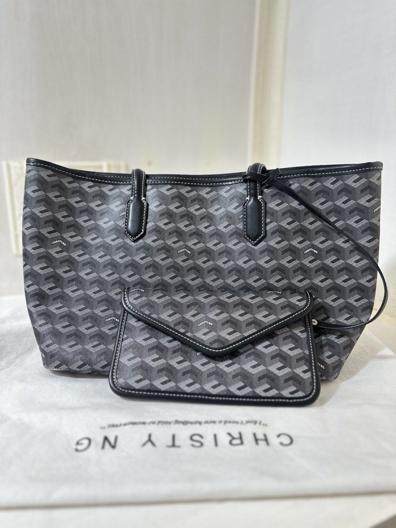 ORIGINAL Christy Ng Russo Tote (Medium- Black) (Category: Tote Bags) located in Kalibo. Submitted by xoxo.kaebb (Listing ID 1468937842, Image 1). Description: Authentic Christy Ng Russo Tote in Black Medium size with Pouch (with Dustbag) - Fits 13” Macbook - Large capacity - Still in very good almost brand new quality (just needs cleaning on the inside) RFS: Decluttering .