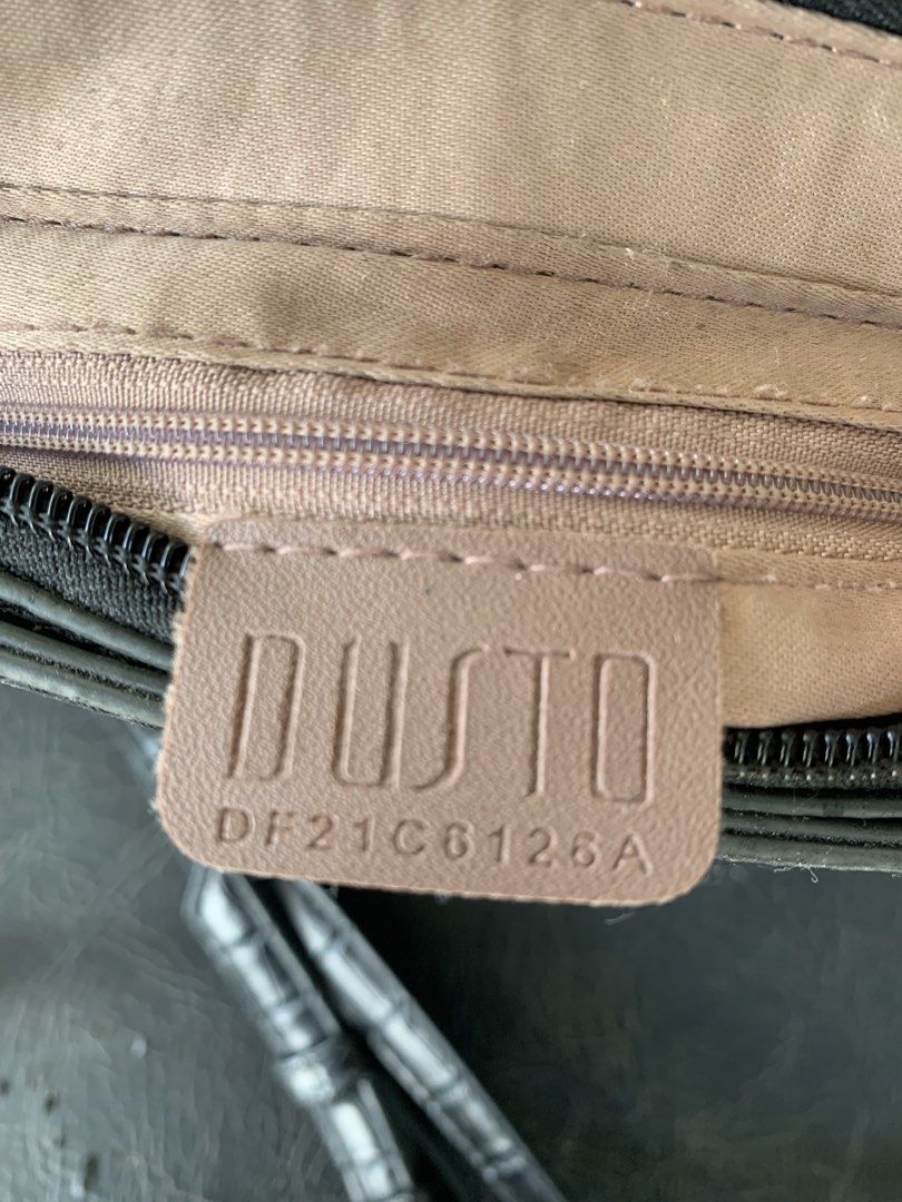 Original Dusto Sling Bag (Category: Cross-body Bags) located in Tarlac. Submitted by abborns (Listing ID 1468964425, Image 2). Description: Original DUSTO sling bag (coded) Preloved please manage your expectations w/ sign of usage but NO bakbak Shipping Nationwide NO COD LOC: Tarlac City.