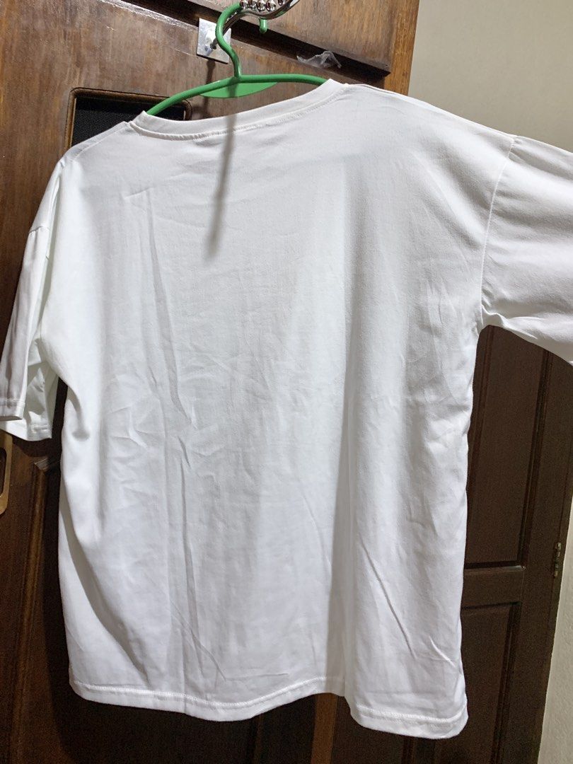 Oversized White Cat Print Shirt - Medium Georman (Category: Shirts) located in Angeles City. Submitted by c.alison (Listing ID 1469095315, Image 3). Description: Never used RFS: Moving out, downsizing my closet 📣 All of my listings will be taken down in February 2027 because I’m moving^^ Feel free to DM me if you have any questions! Shipping via J&T, Grab, or LBC - COD available with LBC Meet up available outside DLSU Taft or SM Clark Payment vi