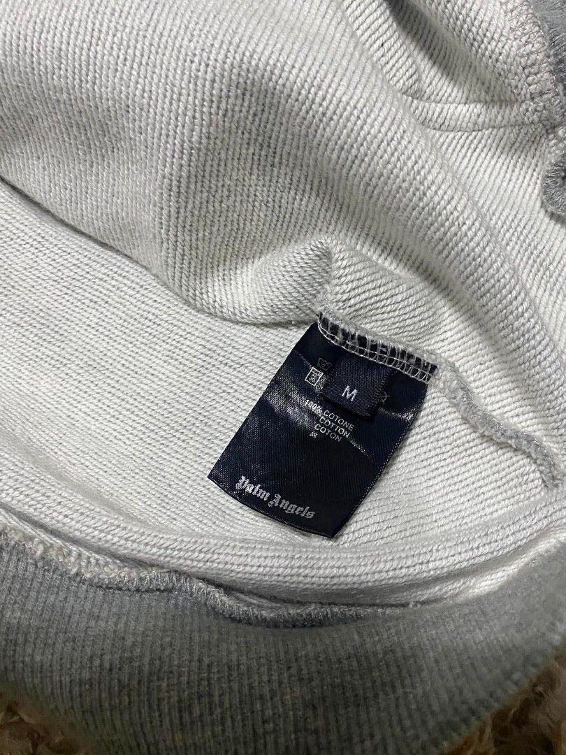 Palm Angel Hoodie (Category: Hoodies) located in Cebu City. Submitted by shatooo (Listing ID 1469134946, Image 3). Description: Embroided lego.