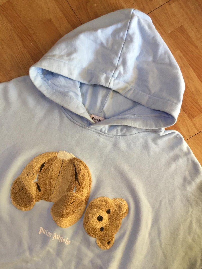 Palm Angels Bear Hoodie Light Blue (Category: Coats, Jackets and Outerwear) located in Manila. Submitted by stmngo (Listing ID 1468939152, Image 2). Description: Size XL on tag Width 23.5 inches Length 28 inches Needwash Good Condition 📍Manage your expectation. Item is thrifted. 📍 Nagcarlan, Laguna .