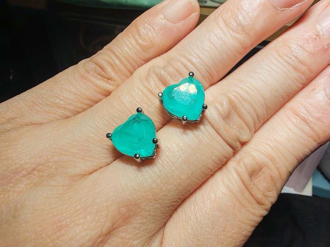 Paraiba heart shaped Stud Earrings with Silver Setting (Category: Earrings) located in Quezon City. Submitted by destashingme (Listing ID 1468951365, Image 1). Description: - Design: Heart-shaped turquoise stud earrings with natural stone texture - Color: Bright aqua green - Details: Metal setting with secure prong settings and butterfly backs - Condition: Clean backs and posts - Versatility: Great for daily wear or special occasions - Size: Comp