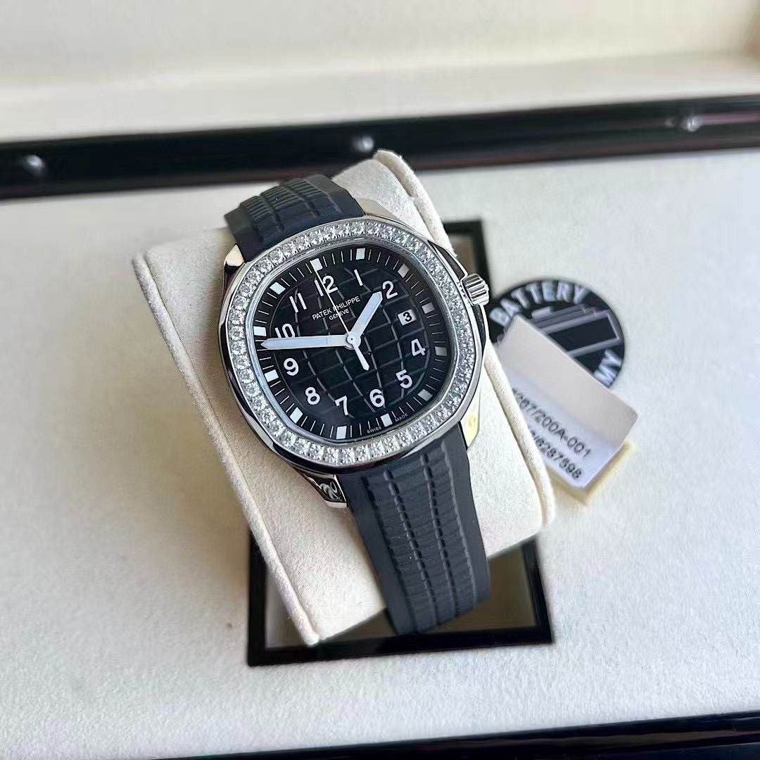 Patek Philippe Aquanaut Luce Diamond Bezel Watch (Category: Luxury Watches) located in Manila. Submitted by kevingarci93240 (Listing ID 1469008546, Image 1). Description: - Brand: Patek Philippe Aquanaut Luce - Bezel: Original Diamond Bezel - Dial: Classic Black Dial with Date Window at 3 o'clock - Strap: Durable Black Composite Strap - Inclusions: Complete with Original Presentation Box and Papers - Condition: Mint, well-kept luxury watch - Mode