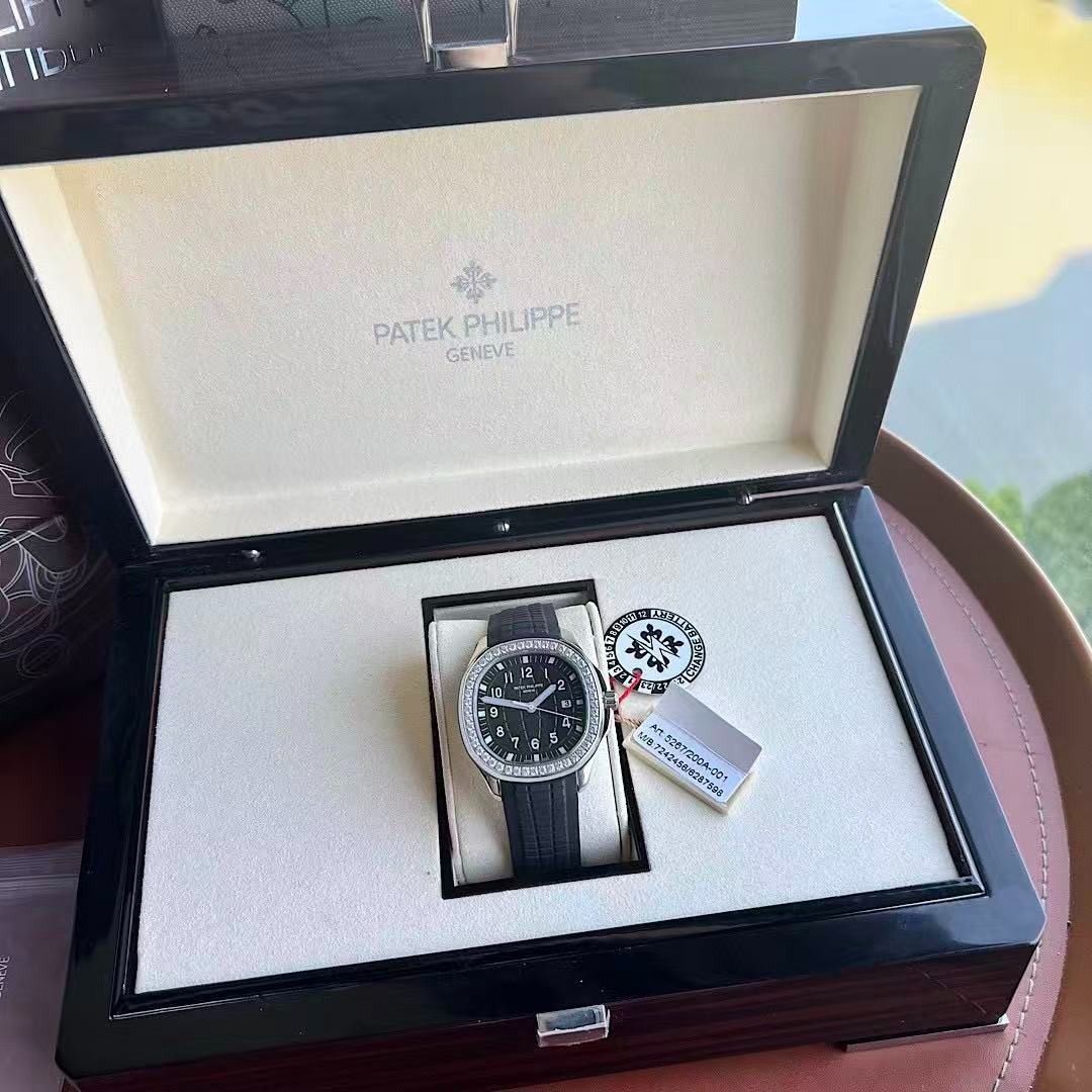 Patek Philippe Aquanaut Luce Diamond Bezel Watch (Category: Luxury Watches) located in Manila. Submitted by kevingarci93240 (Listing ID 1469008546, Image 2). Description: - Brand: Patek Philippe Aquanaut Luce - Bezel: Original Diamond Bezel - Dial: Classic Black Dial with Date Window at 3 o'clock - Strap: Durable Black Composite Strap - Inclusions: Complete with Original Presentation Box and Papers - Condition: Mint, well-kept luxury watch - Mode