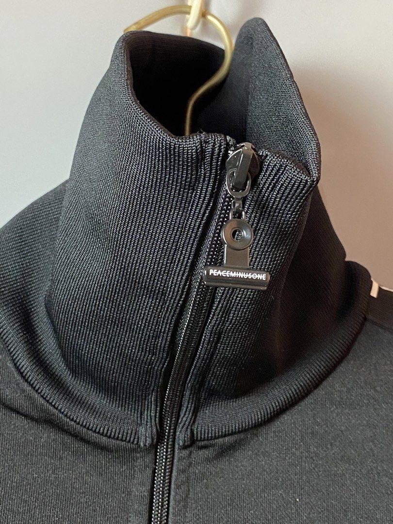 Peaceminusone Jacket (Category: Coats, Jackets and Outerwear) located in Quezon City. Submitted by loloyz123 (Listing ID 1469077448, Image 2). Description: Peaceminusone Jacket Condition: Very good Color rate: 10/10 Color: Black Size: Medium l: 26 W: 19 inches.