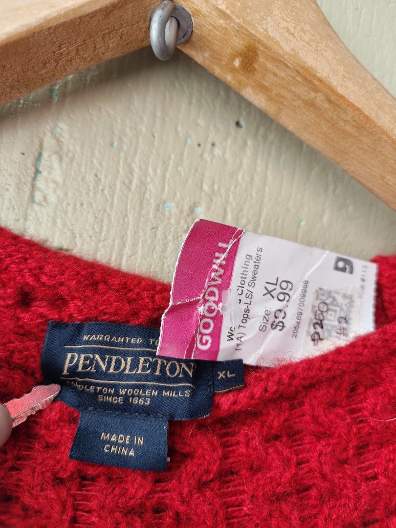 Pendleton Red Cable Knit Shetland Wool Sweater Size XL (Category: Coats, Jackets and Outerwear) located in Binan City. Submitted by makinpeso0622 (Listing ID 1469015450, Image 3). Description: - Brand: Pendleton - Color: Bright Red - Size: XL - Material: 100% Shetland Wool - Style: Classic crewneck, long sleeves, ribbed trim, textured cable knit - Care: Machine wash cold, gentle cycle.