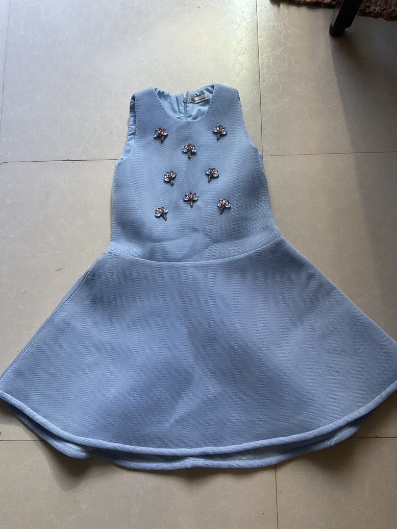 Peppermint Light Blue Embellished Dress (Category: Babies & Kids Fashion) located in Cabanatuan. Submitted by dindin_7 (Listing ID 1468937666, Image 2). Description: FOR SALE: Peppermint Light Blue Embellished Dress 🩵✨ Brand: Peppermint Size: 14 (beat fit 10-12yrs old) Color: Light Blue / Baby Blue Details: Textured mesh-like fabric, sleeveless, may magagandang crystal/beaded floral embellishments sa bodice, at back zipper. Condition: Preloved /