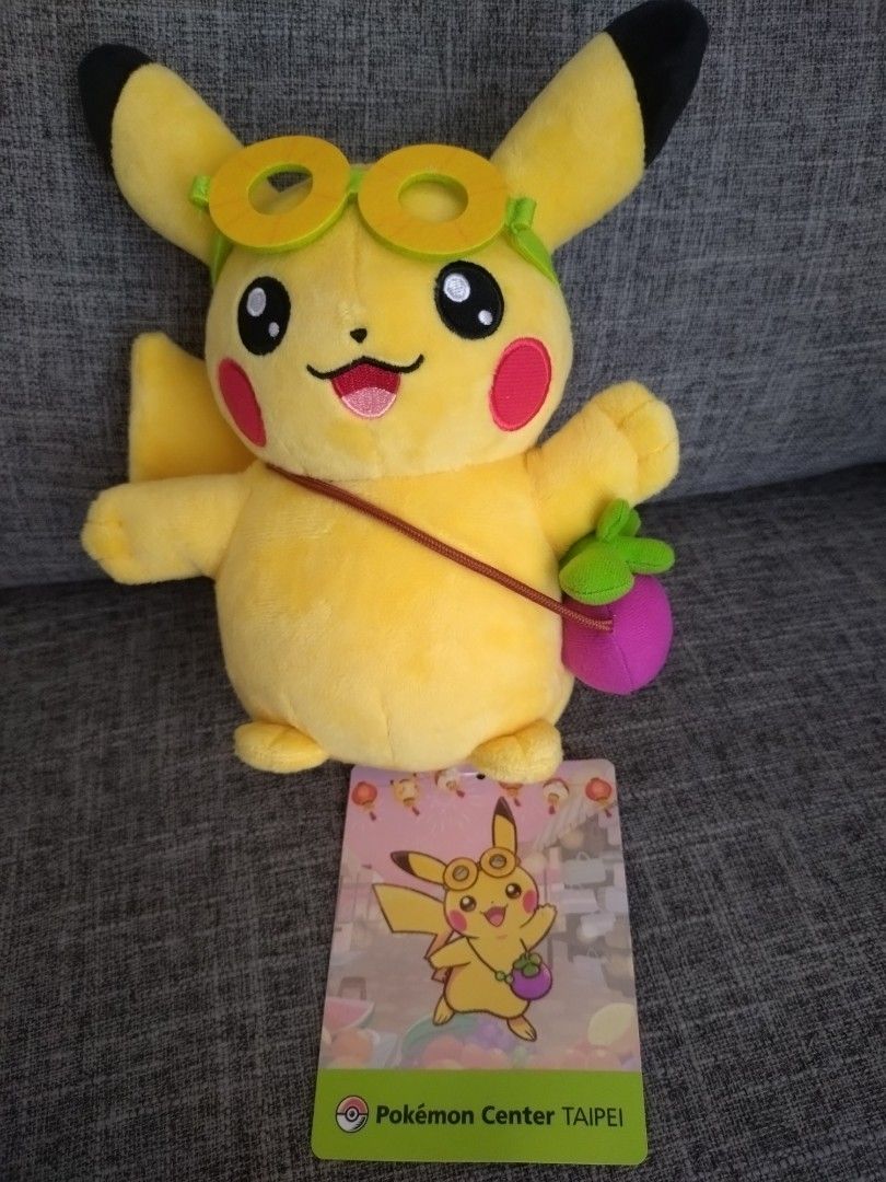 Pikachu plushie - Special Taiwan edition (Category: Plushies & Soft Toys) located in Taytay. Submitted by nhitoi (Listing ID 1468982620, Image 3). Description: - Official Pokémon Center Taipei Exclusive Pikachu plushie wearing cute pineapple ring glasses and fruit bag - Brand new with official tag RFS: bought extra.