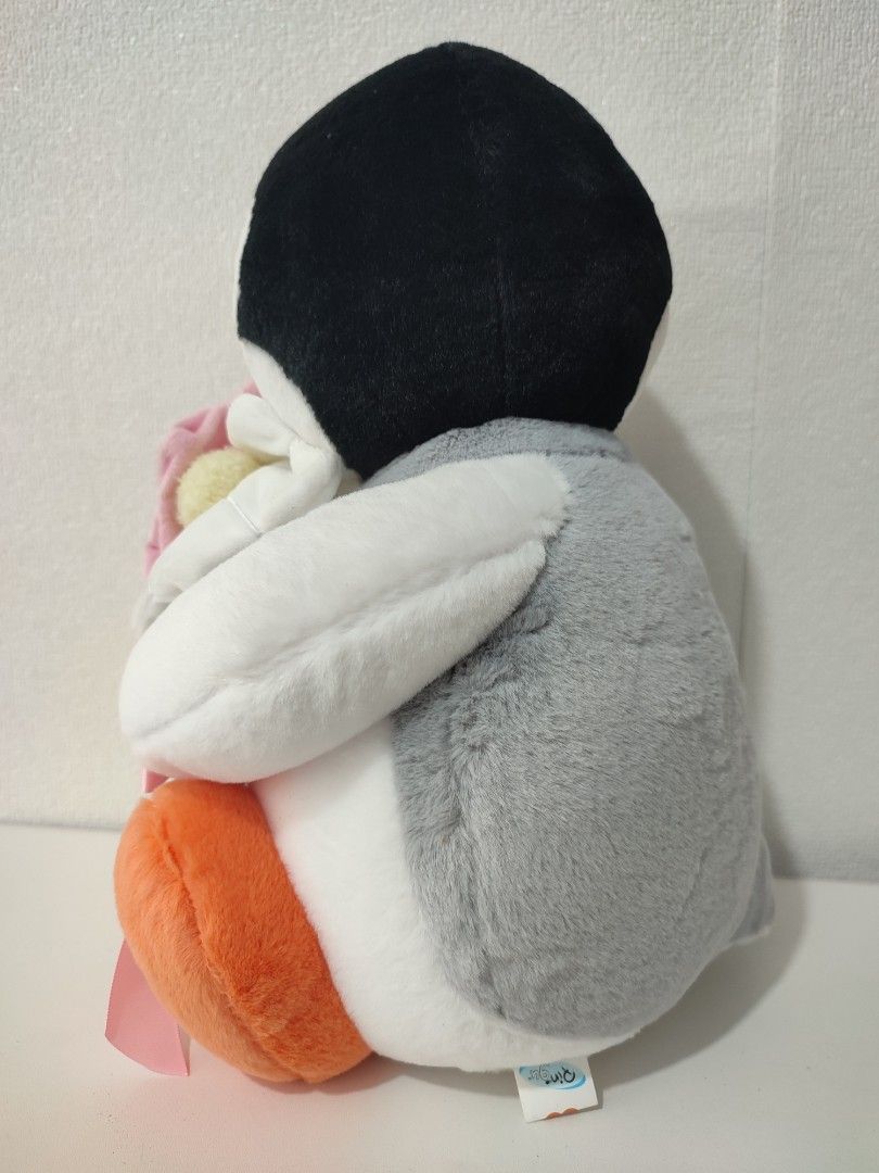 Pingu plush toy holding pink flower (Category: Plushies & Soft Toys) located in Manila. Submitted by epicmountain-f20453 (Listing ID 1468983619, Image 3). Description: - Adorable official Pingu plush toy holding a pink flower with a green stem and pink ribbon - Classic color scheme: white, black, grey, and orange - Comes with original Pingu branding tag - Stored properly in a clean, smoke-free space - Perfect for gifts, collectors, or Pingu fans!