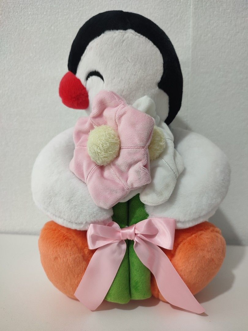 Pingu plush toy holding pink flower (Category: Plushies & Soft Toys) located in Manila. Submitted by epicmountain-f20453 (Listing ID 1468983619, Image 2). Description: - Adorable official Pingu plush toy holding a pink flower with a green stem and pink ribbon - Classic color scheme: white, black, grey, and orange - Comes with original Pingu branding tag - Stored properly in a clean, smoke-free space - Perfect for gifts, collectors, or Pingu fans!