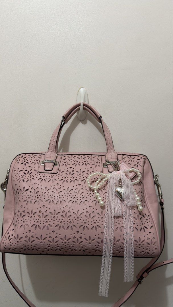 Pink Coach Taylor Eyelet Leather Satchel (Category: Luxury Bags & Wallets) located in Manila. Submitted by coffeepanda1234 (Listing ID 1469088455, Image 1). Description: No issue super nice in person :) With care card.