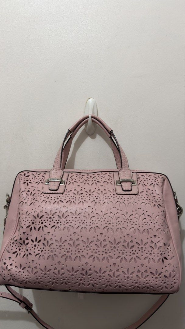 Pink Coach Taylor Eyelet Leather Satchel (Category: Luxury Bags & Wallets) located in Manila. Submitted by coffeepanda1234 (Listing ID 1469088455, Image 2). Description: No issue super nice in person :) With care card.