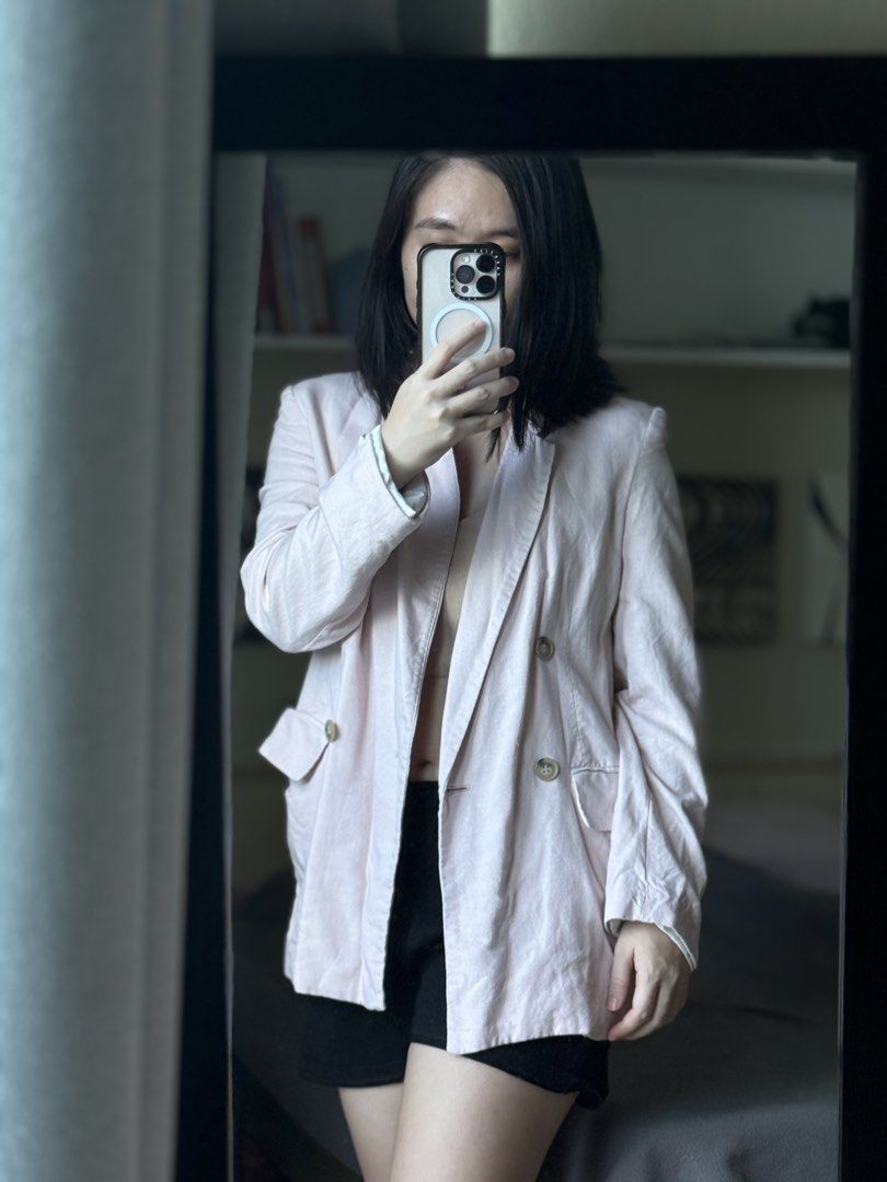 Pink double breasted oversized blazer jacket (Category: Coats, Jackets and Outerwear) located in Pasig City. Submitted by laagn.ph (Listing ID 1469090012, Image 3). Description: - Color: Light pink - Style: Oversized, double-breasted with chunky horn-style buttons - Pockets: Functional flap pockets at the hips - Fit: Relaxed through the body and sleeves for easy layering - Fabric: Lightweight and ideal for trans-seasonal weather - Versatility: Pe
