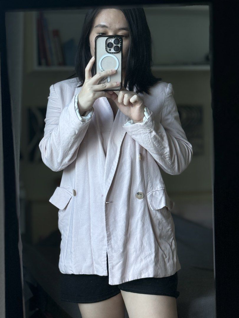 Pink double breasted oversized blazer jacket (Category: Coats, Jackets and Outerwear) located in Pasig City. Submitted by laagn.ph (Listing ID 1469090012, Image 1). Description: - Color: Light pink - Style: Oversized, double-breasted with chunky horn-style buttons - Pockets: Functional flap pockets at the hips - Fit: Relaxed through the body and sleeves for easy layering - Fabric: Lightweight and ideal for trans-seasonal weather - Versatility: Pe