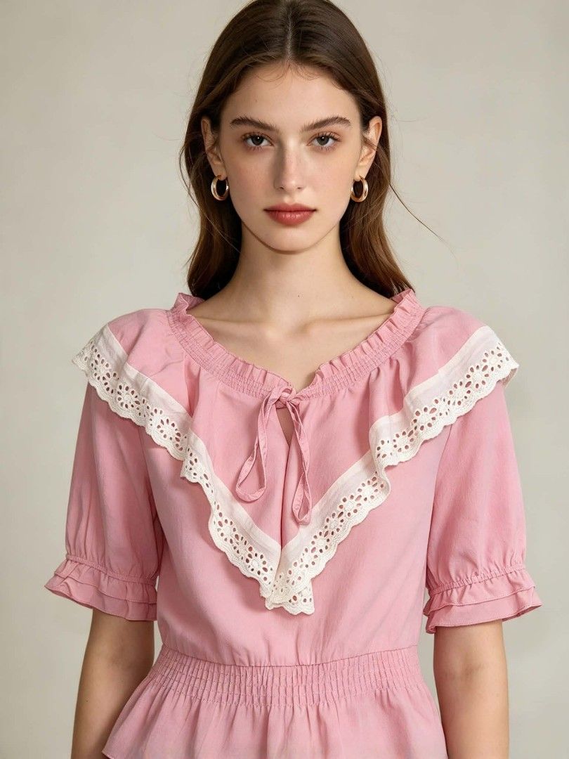Pink Eyelet Ruffle Off Shoulder Blouse (Category: Blouses) located in Caloocan City. Submitted by mylove326 (Listing ID 1469031264, Image 1). Description: Pink cotton blouse with a big white eyelet lace collar. Half sleeves with ruffled cuffs. Smocked elastic waist and neckline with a drawstring tie. Measurements check photos probably for Small-medium .