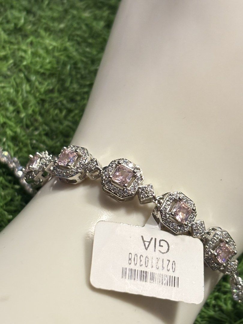 Pink padparadscha tennis bracelet (Category: Bracelets) located in Davao. Submitted by ememlou17 (Listing ID 1469073578, Image 3). Description: tennis beacelet Size7-7.5 With markings pt950 Uv reactive Rodium/ Platinum over copper based metal Tarnish resistant with extra care Message me directly📩.