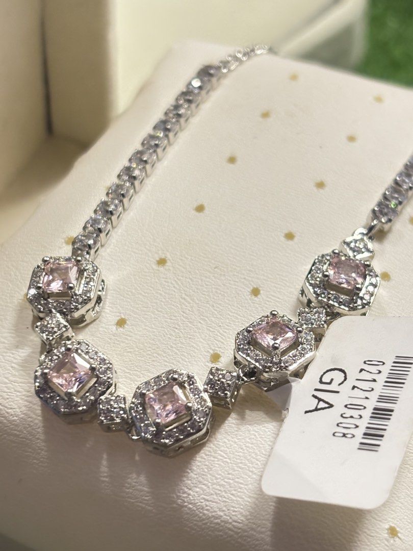 Pink padparadscha tennis bracelet (Category: Bracelets) located in Davao. Submitted by ememlou17 (Listing ID 1469073578, Image 1). Description: tennis beacelet Size7-7.5 With markings pt950 Uv reactive Rodium/ Platinum over copper based metal Tarnish resistant with extra care Message me directly📩.